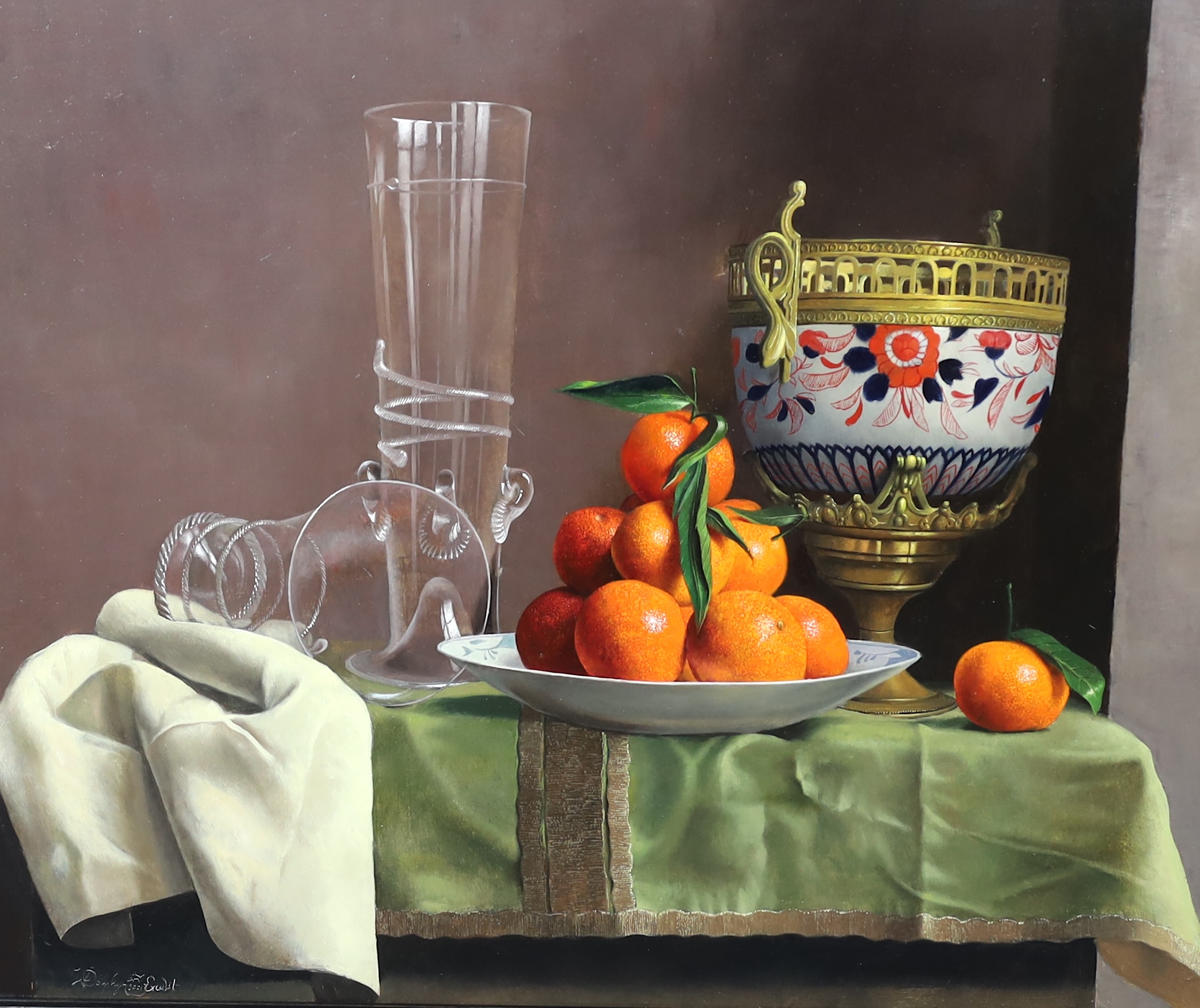 Willem Dolphyn (Belgian, 1935-2016), Still life of oranges, glassware and an ormolu mounted vase upon a draped table, oil on panel, 49 x 58cm